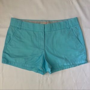 J. Crew turquoise chino shorts.